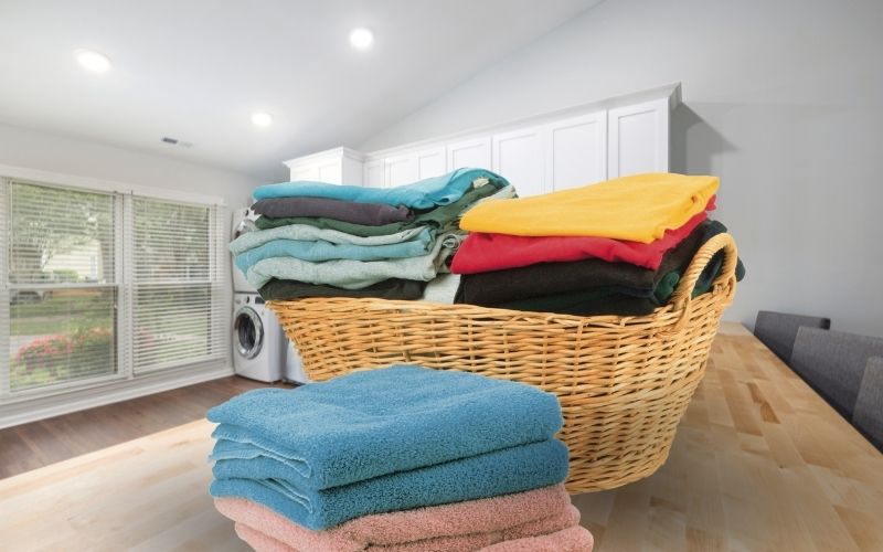 Photo showing folded clothes on counter top